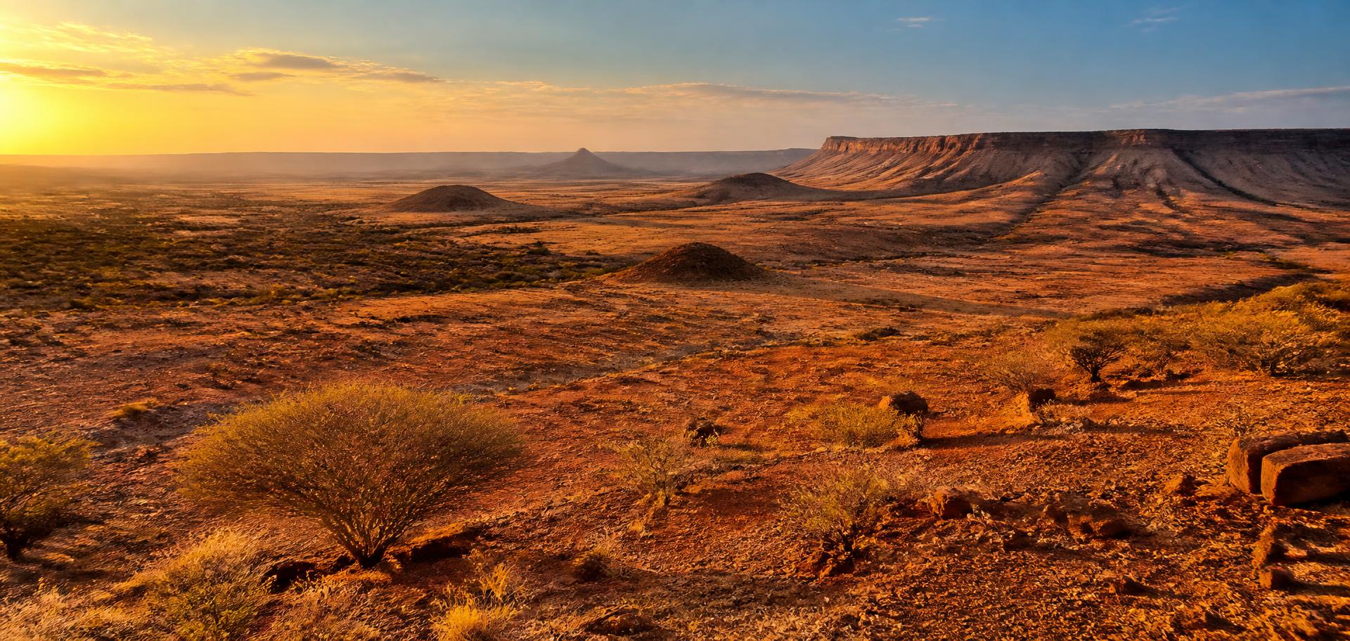 Open plateau country in the Sool region at golden hour — illustrative landscape.